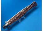 Showcasing the Exquisite Dolphin Stag Mariano Switchblade